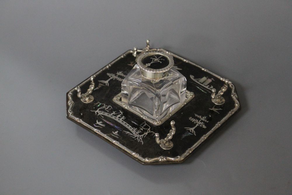 An Edwardian silver, mother of pearl and tortoiseshell chinoiserie inkstandish, retailed by Goldsmiths & Silversmiths Co Ltd,